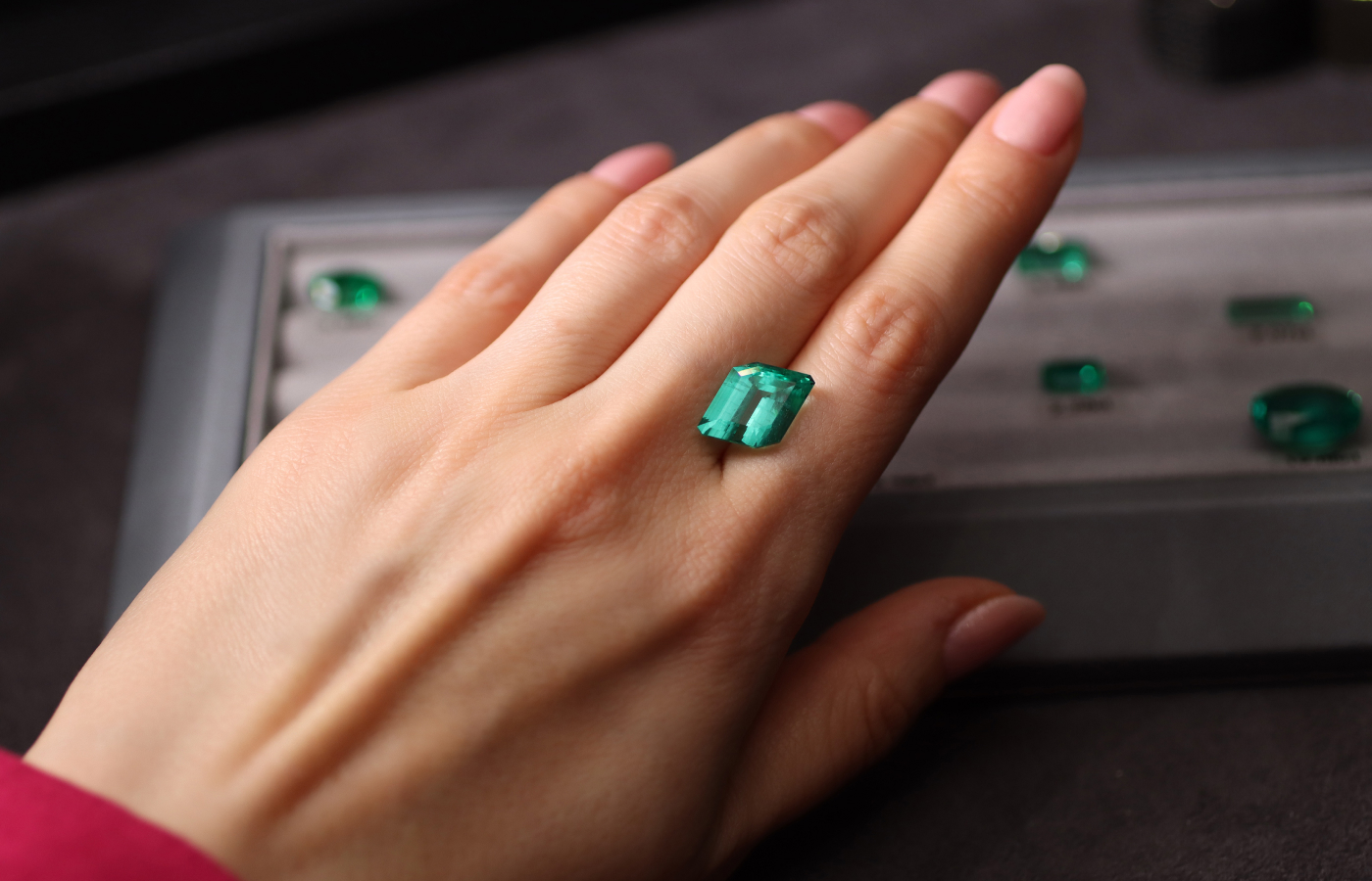 A fancy-cut Russian emerald from the supply of Tsarina Jewels 