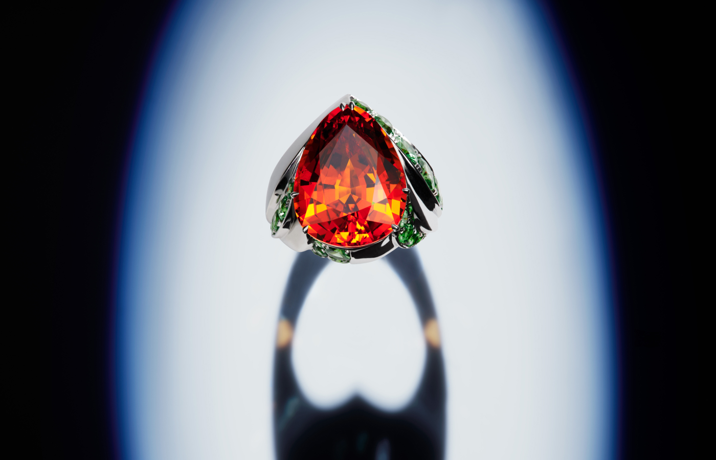 REZA Cercle ring in white gold, set with a 19.6-ct garnet and tsavorites