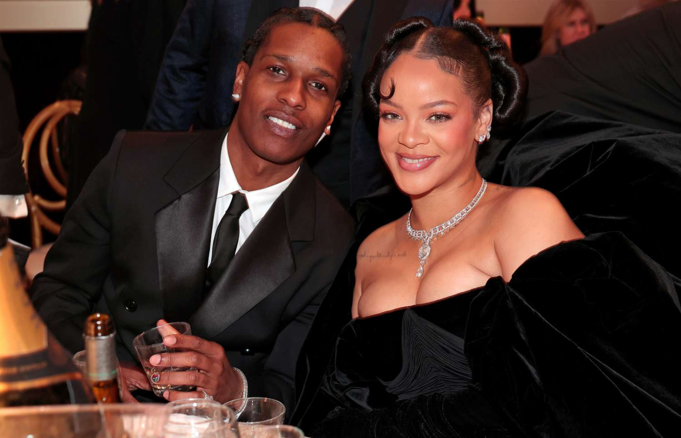 Rihanna at the Golden Globe Awards wearing a pear-shaped diamond stud from REZA, a diamond ear climber, Cartier diamond-set earrings and a Cartier Sixième Sens High Jewellery necklace