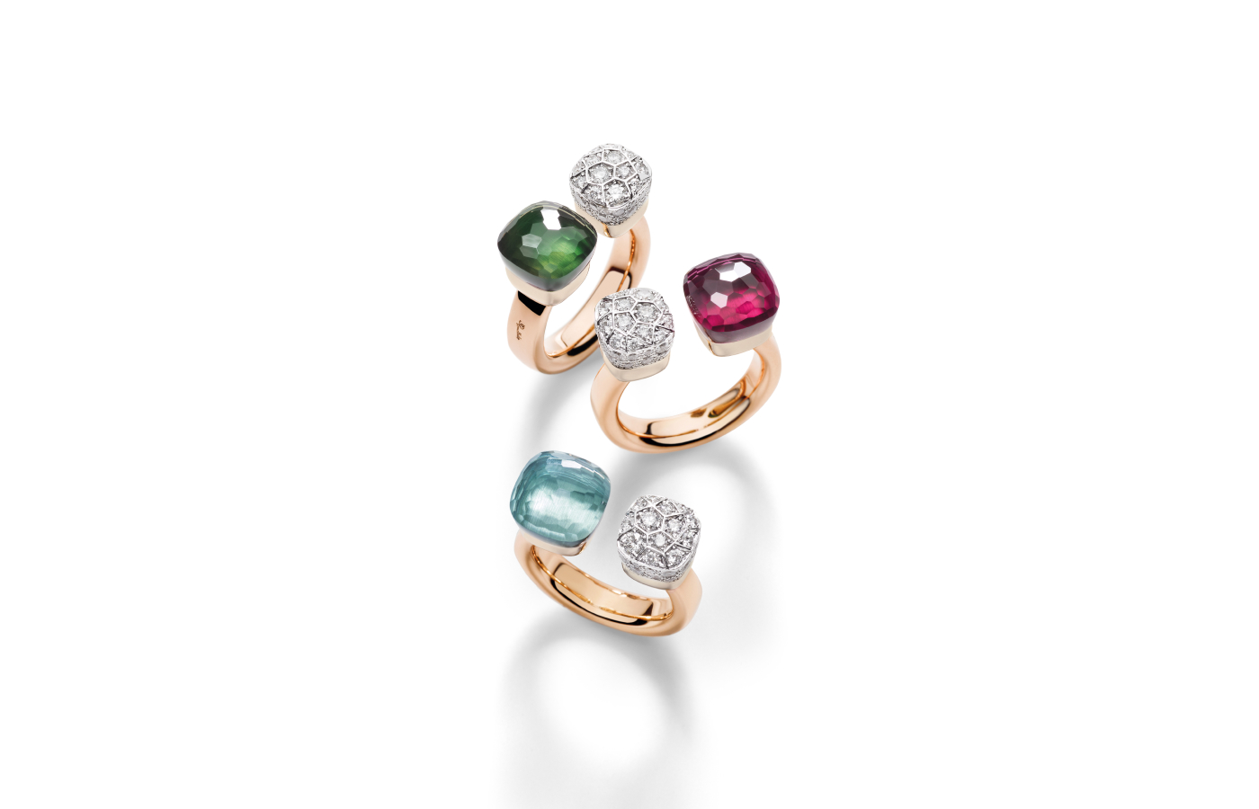 Pomellato Nudo Triennale rings in gold, rubellite, aquamarine, tourmaline and diamond from the Ode to Milan high jewellery collection