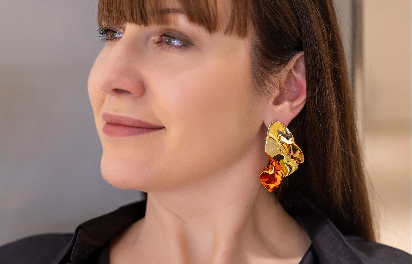  Katerina Perez wears earrings by Theodora at the A Jewel Made in Greece launch event at Attica department store