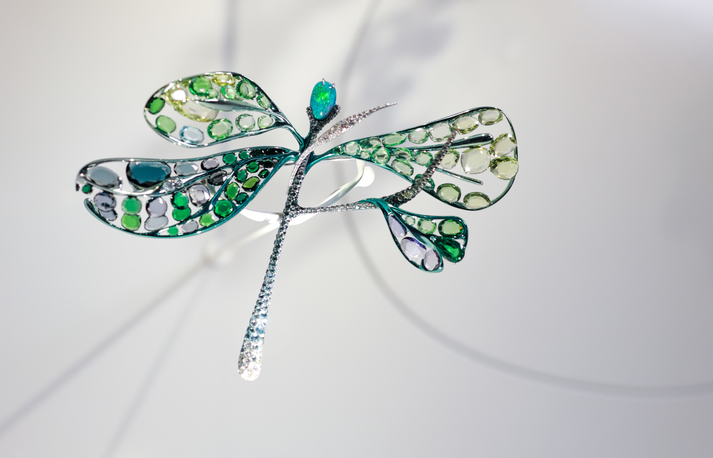 Feng J Je Suis La Brise brooch with ‘colourful grey’ double rose-cut spinels and an opal cabochon in titanium 