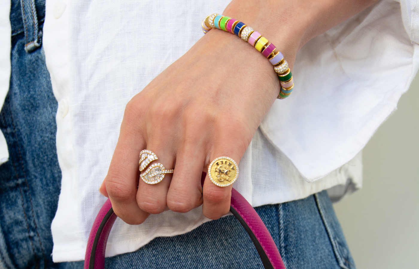 Model wearing Anita Ko Aries Zodiac ring in gold and diamond
