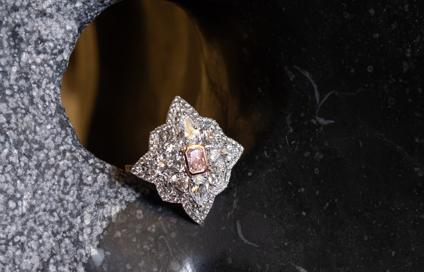  A closer look at the ZARIG Aurelia pink diamond cocktail ring with an octagonal-shaped and bezel-set pink diamond surrounded by fancy-cut colourless diamonds