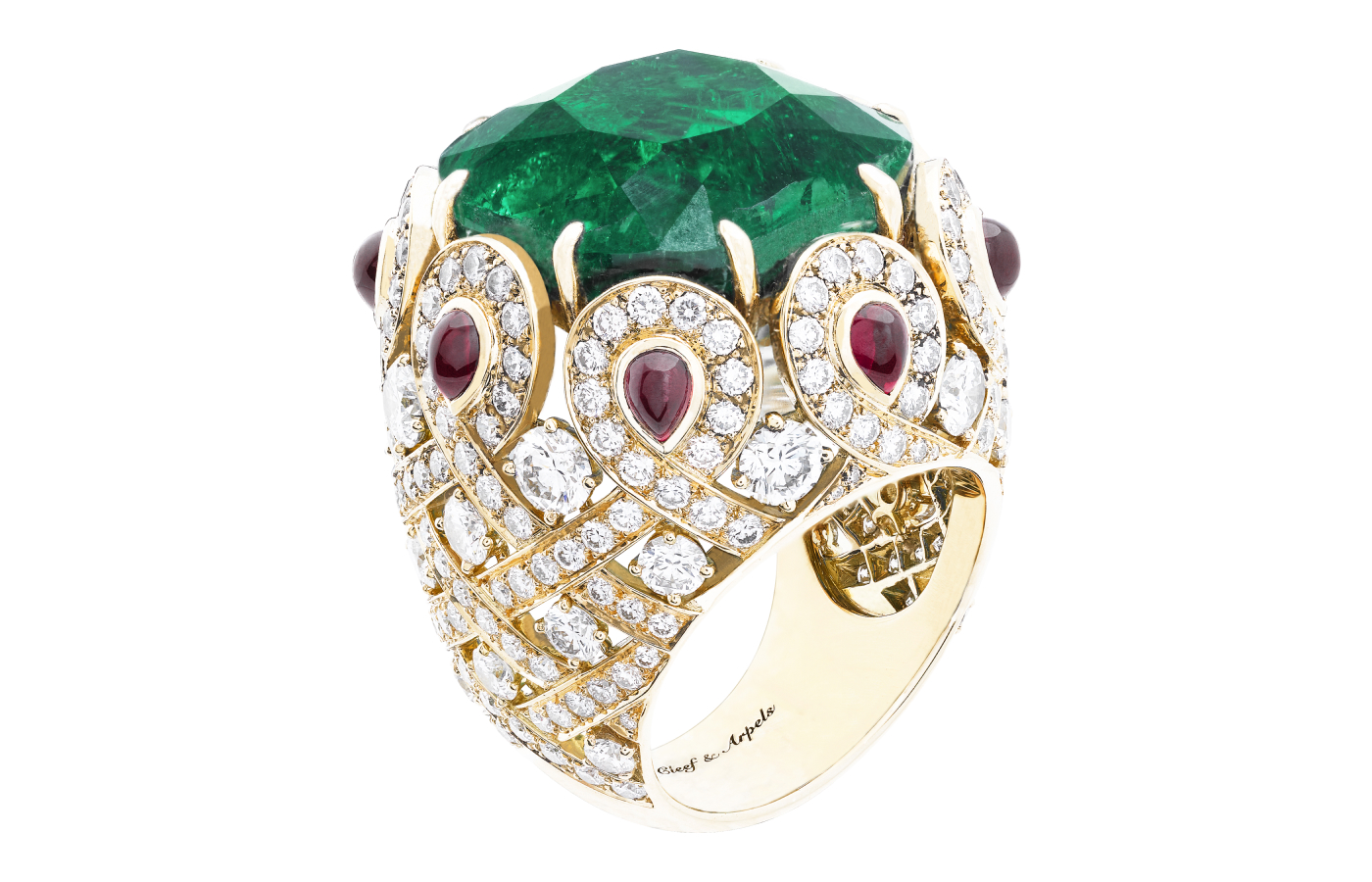 Evocative of cocktail rings once popular in the roaring 1920s and the stylish 1960s, the Pongal ring (2012) recalls the bright greens and reds of Pongal, a Hindu festival that marks the winter solstice. From the Pierres de Caratères Variations Collection, the centerpiece of this cocktail ring is a 27.81-carat emerald from Colombia, highlighted by yellow gold, rubies, and diamonds. Photo: Van Cleef & Arpels
