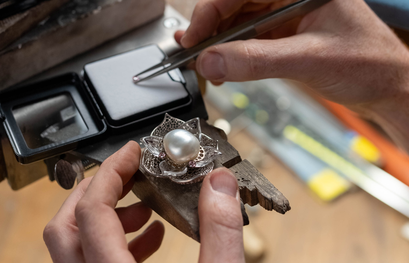 Matthew Ely crafts the Lotus Flower brooch-pendant for the Iluka necklace with rare Argyle pink diamonds 