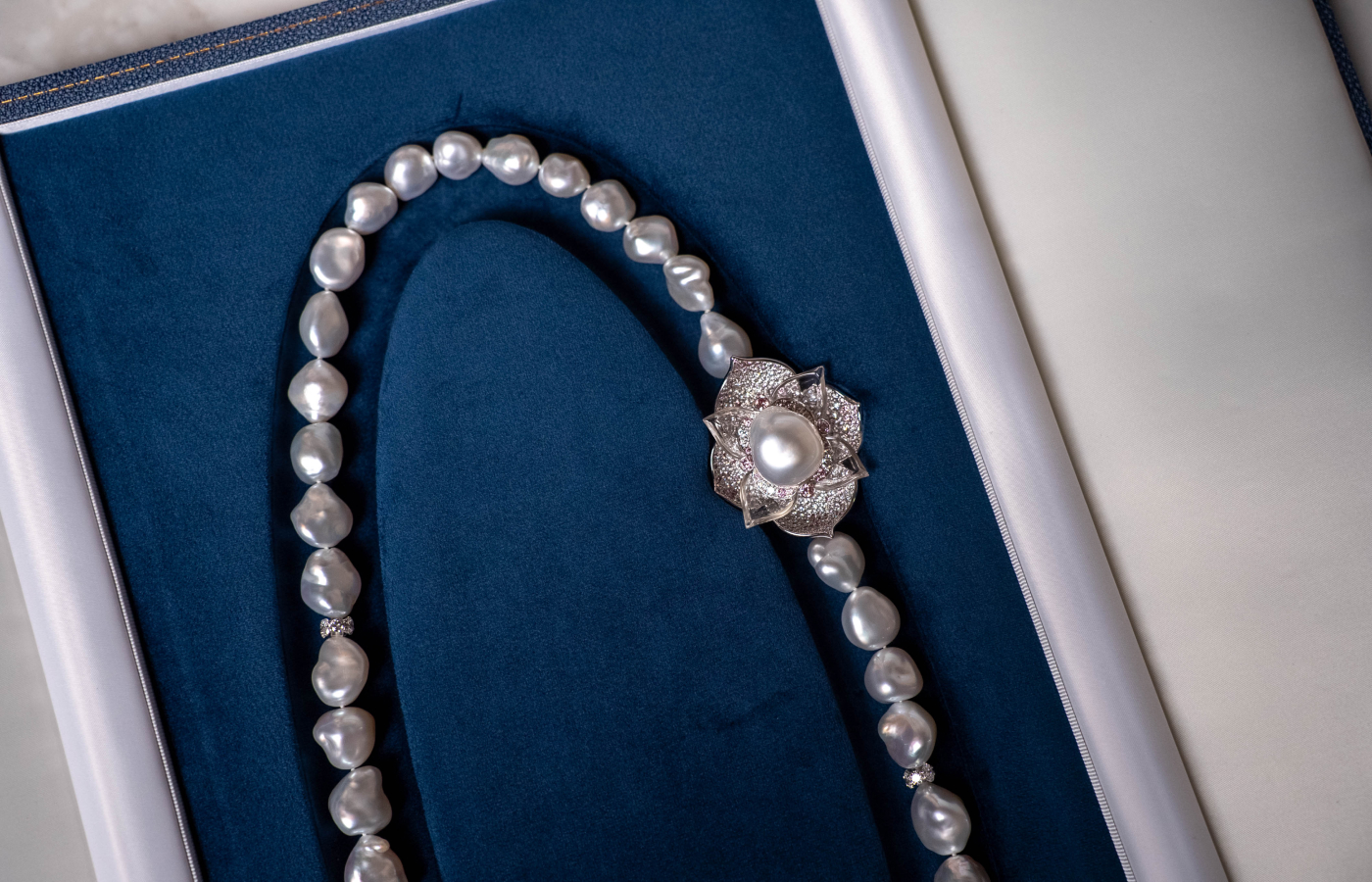  Matthew Ely dedicated a further four years to designing and finishing his Iluka necklace, complete with a lotus flower-inspired brooch-pendant  