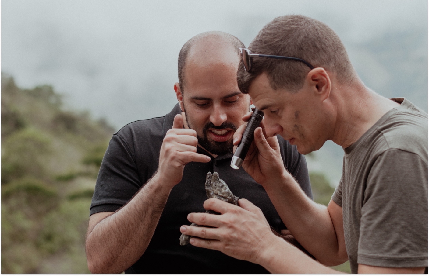 Carlos Torres and Dr Laurent Massi of The Gem Odyssey inspecting an emerald sample in the emerald region of Muzo, Colombia