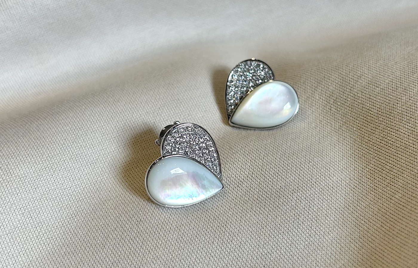 Zeemou Zeng Heart collection ear studs in 18k white gold with pavé diamonds and mother of pearl