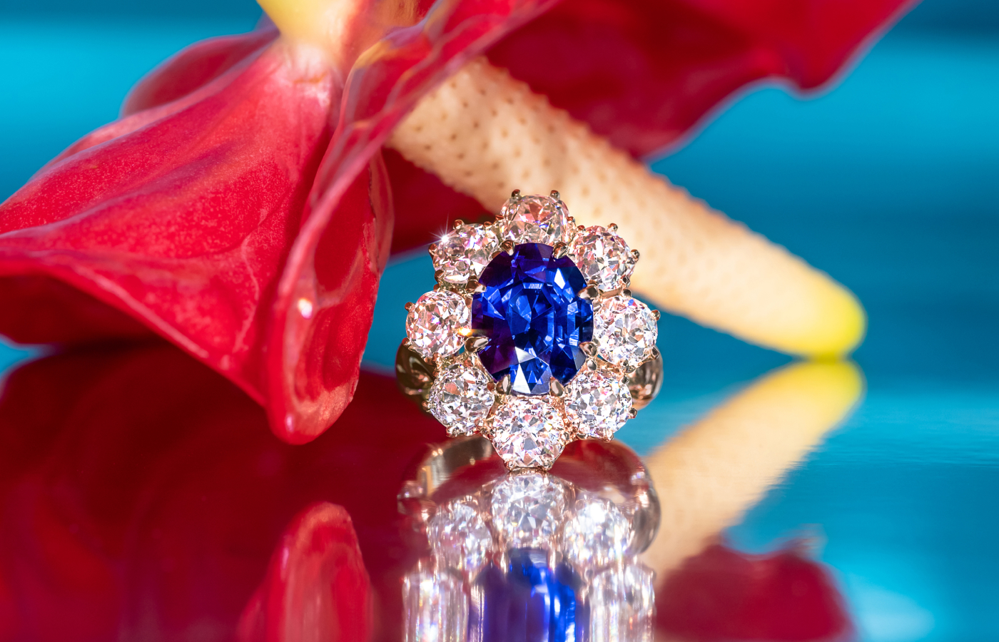  MADLY bespoke 5-carat no-heat royal blue sapphire ring surrounded by a halo of specially sourced old-mine cut diamonds
