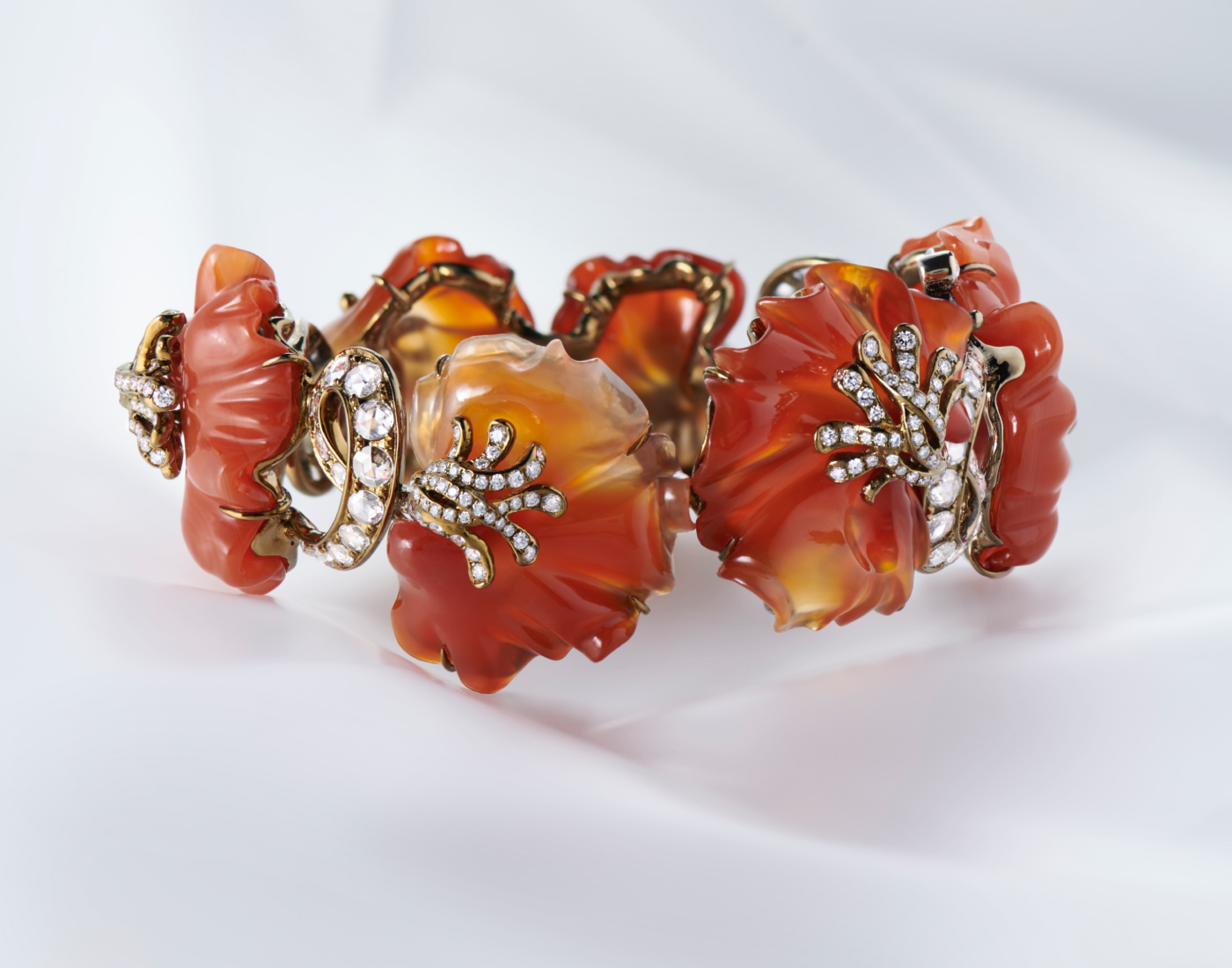  Neha Dani Moriko bracelet with custom carved agate set in titanium, surrounded by rose-cut and round diamonds 
