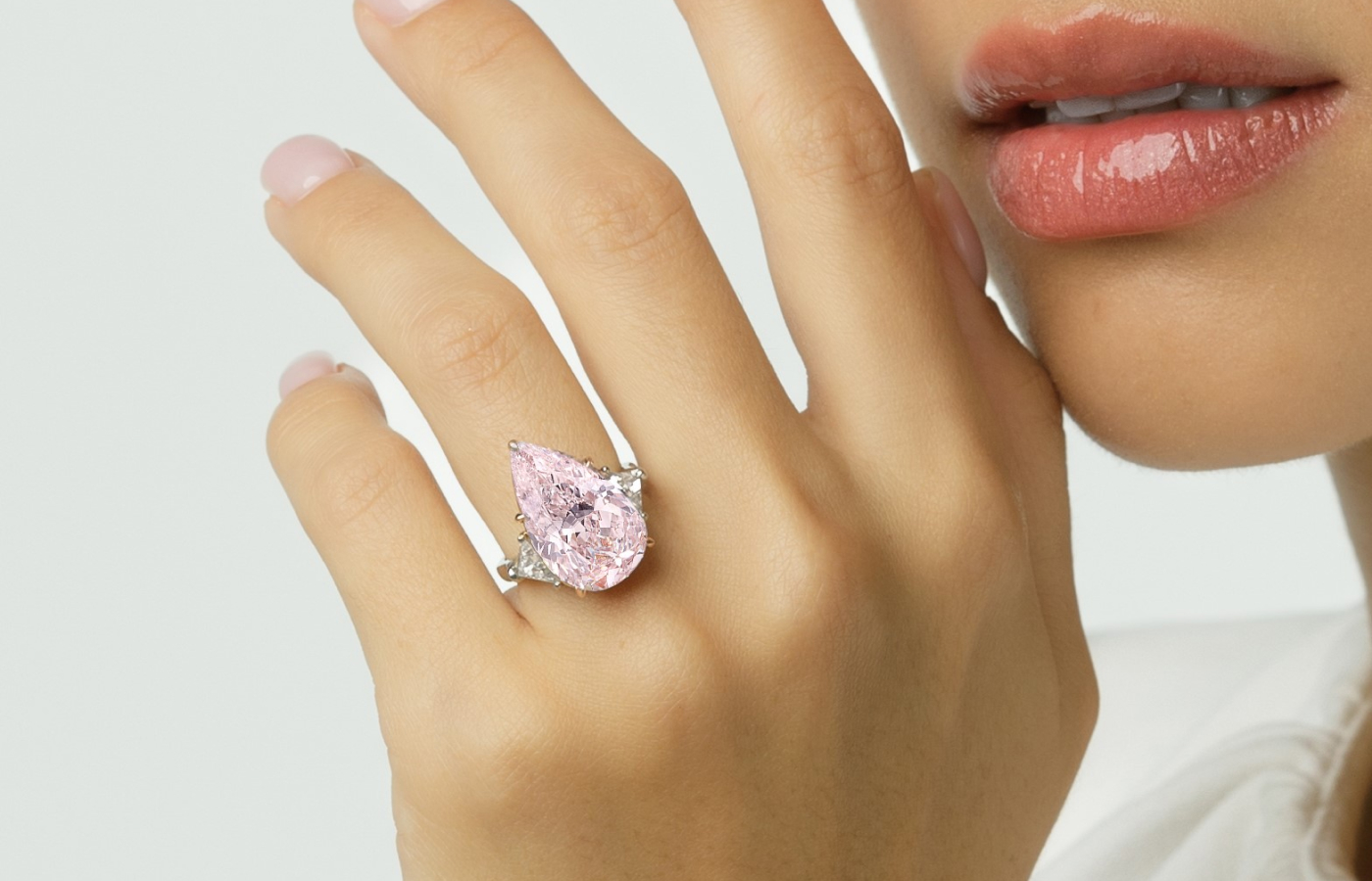 House of GOL pear-shaped fancy pink diamond ring with colourless diamond side stones 