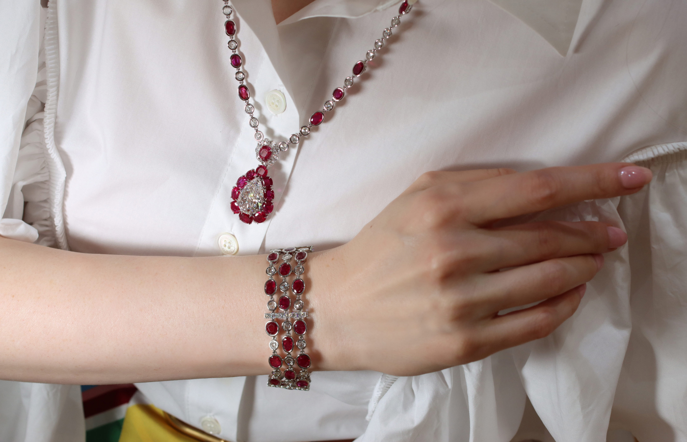  Katerina Perez wears the House of GOL Heritage necklace with Burmese rubies, a 10.02 carat pear-shaped diamond and rose-cut diamonds, alongside the Heritage bracelet with 33 Burmese rubies of 31.72 carats and 82 diamonds of 6.33 carats 