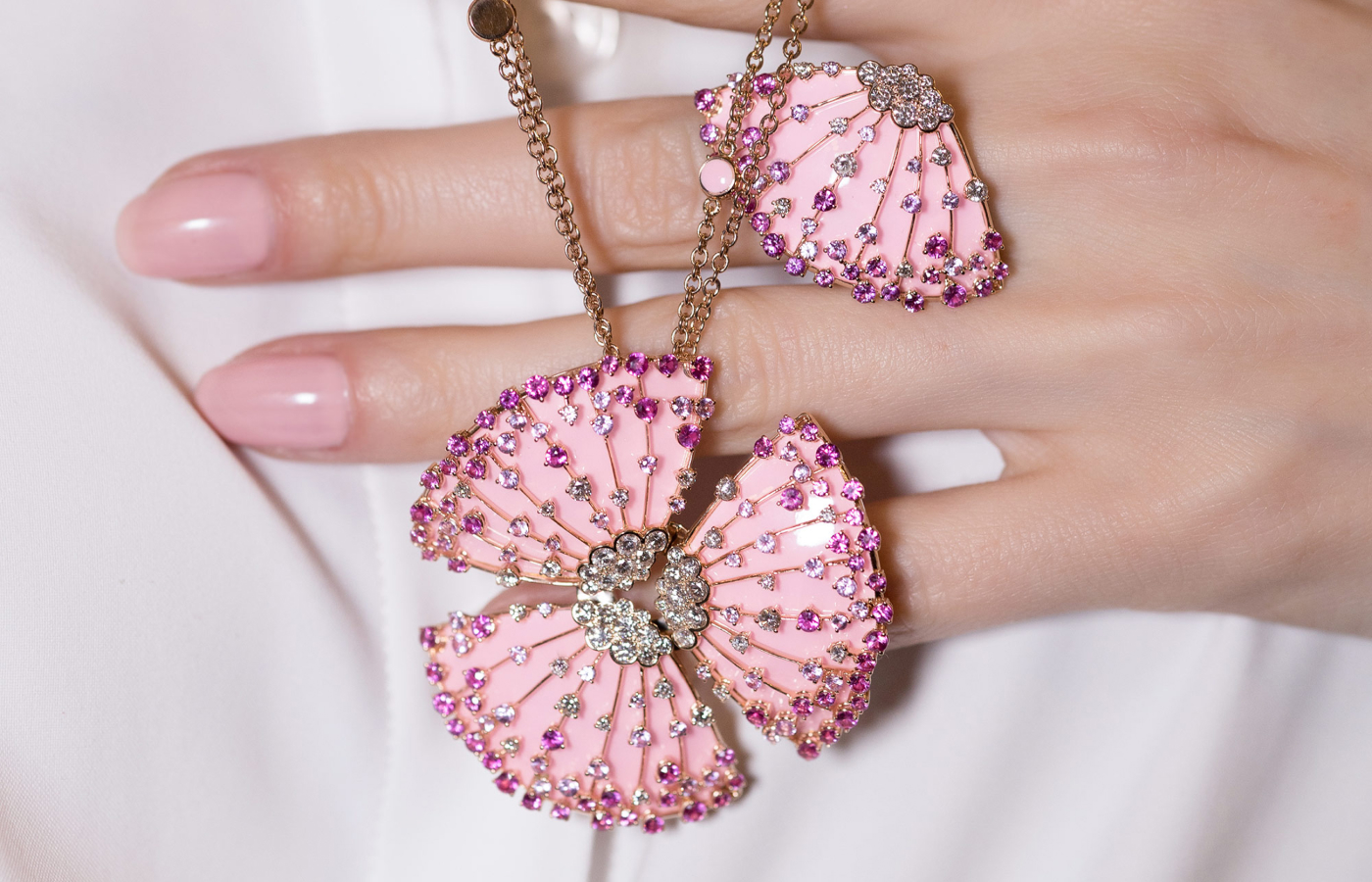 FerriFirenze Lucciola collection pendant necklace and ring in 18k rose gold, hand-painted pink enamel, pink sapphires and colourless diamonds 