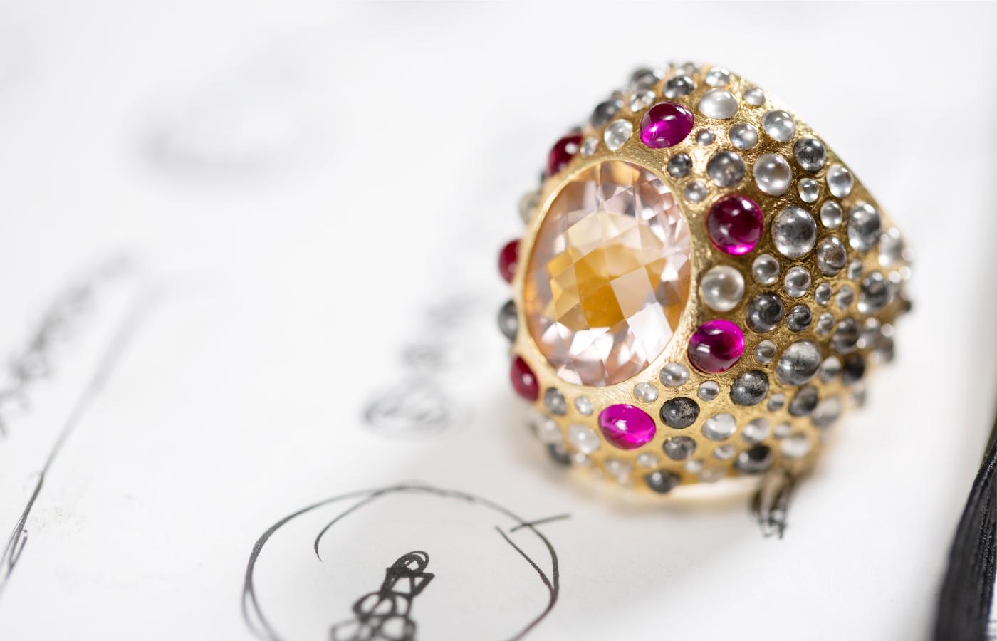 Todd Reed ring in 18k yellow gold with an 11.59 carat morganite, ruby cabochons and diamond cabochons 