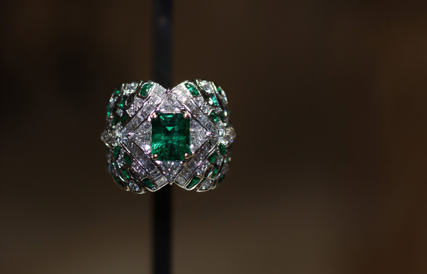  An emerald and diamond ring from the Louis Vuitton Deep Time Chapter II High Jewellery collection, photographed at Paris Haute Couture Week 