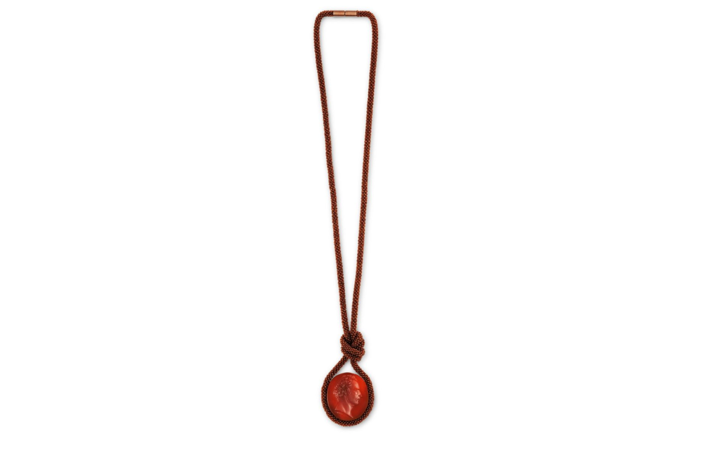  Hemmerle intaglio pendant with carnelian set in copper, white gold and red gold. Courtesy of Hemmerle