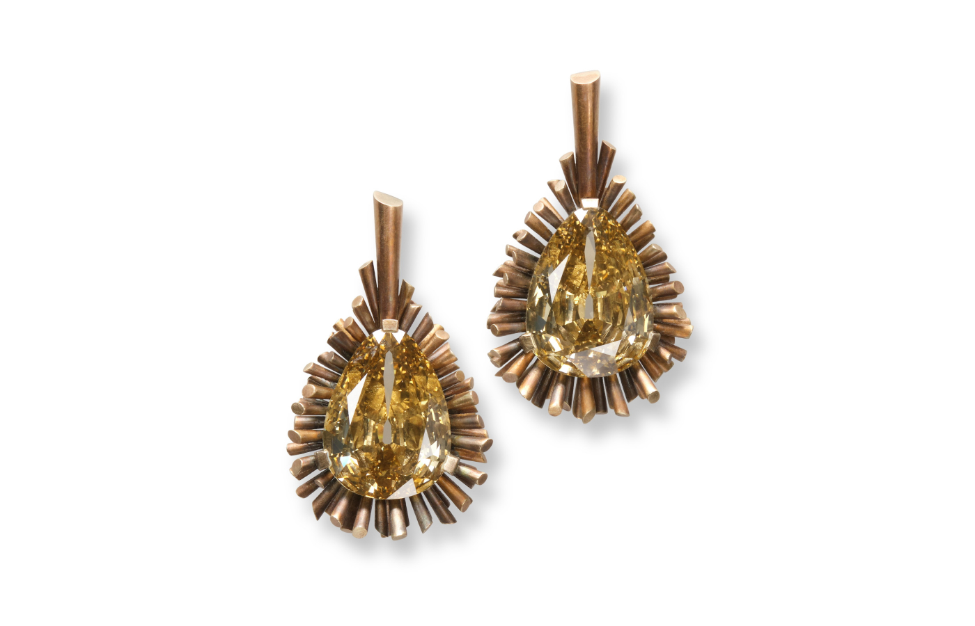  Hemmerle earrings with fancy deep brown yellow diamonds totalling more than 12 carats, set in bronze and white gold. Courtesy of Hemmerle