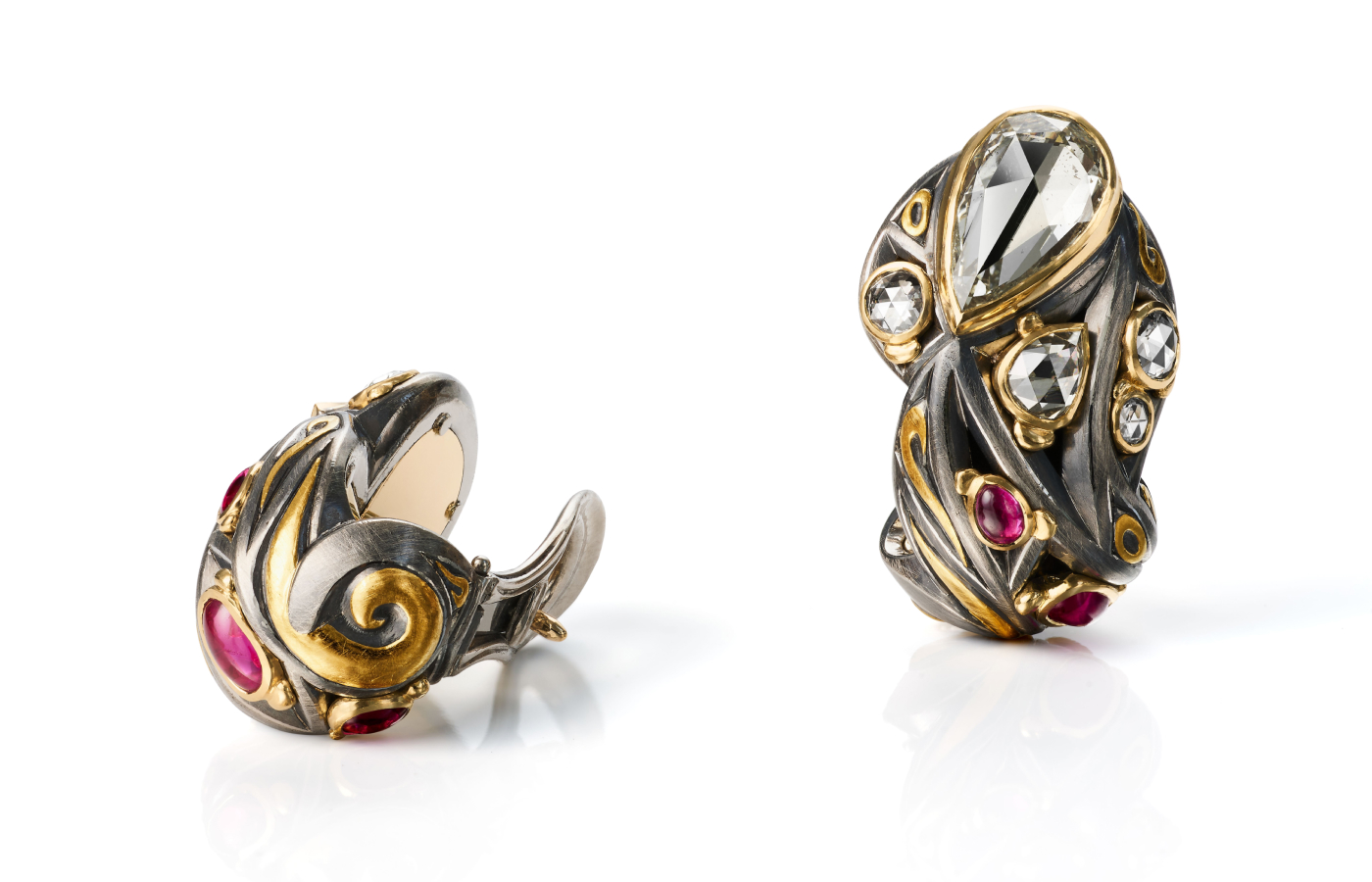  The Otto Jakob Fiametta earrings in blackened white gold, painted gold accents, rose-cut diamonds, and ruby cabochons will be featured at TEFAF Maastricht in March 2024