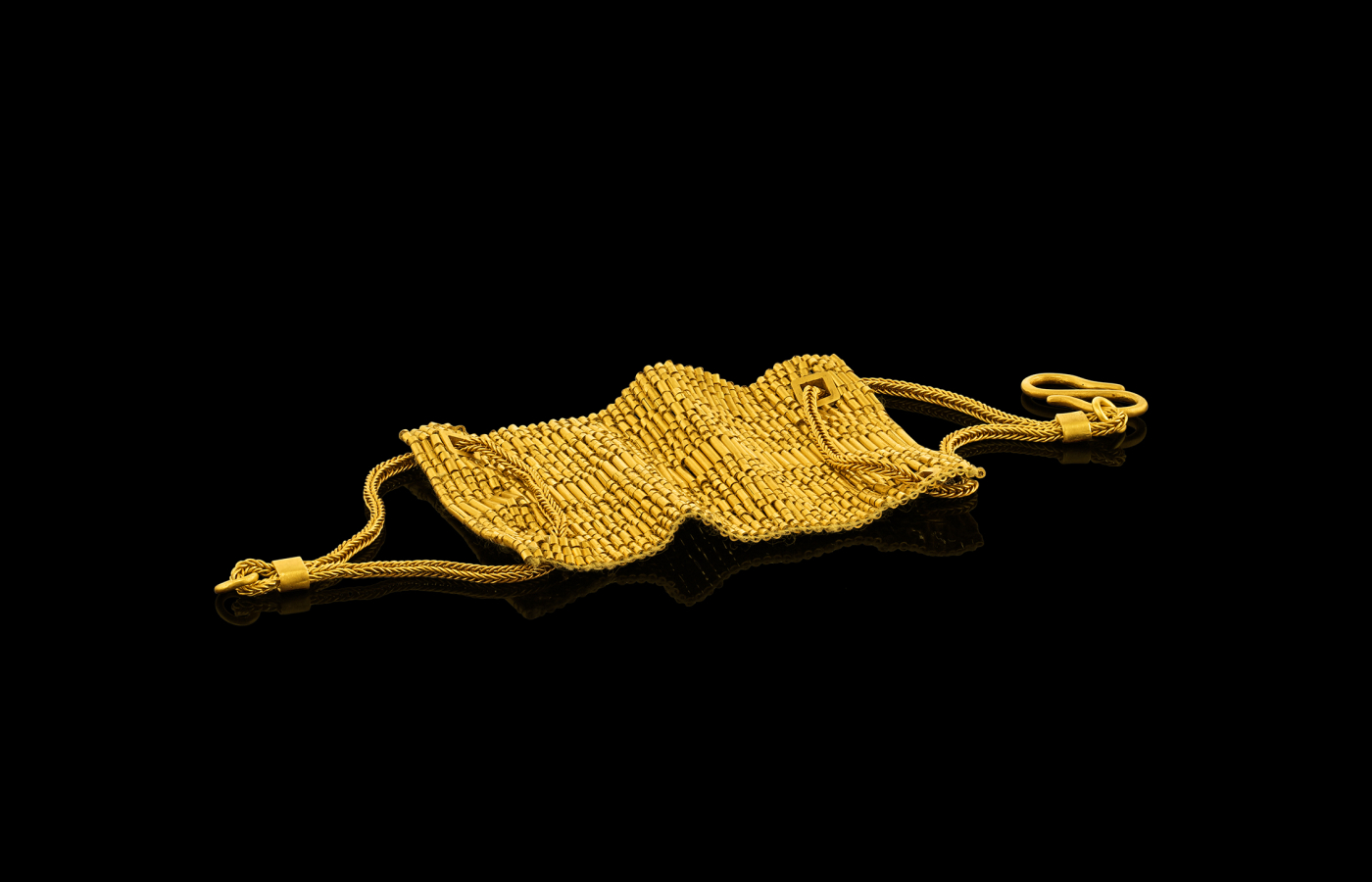  The sail of the Viking Longship by Loren Nicole can be detached and worn as a 22k yellow gold bracelet  