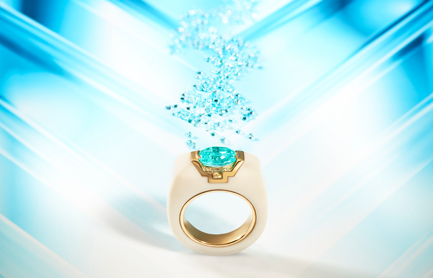 Inés Nieto Taura ring in rose gold, white cacholong, featuring a 5.82-ct Paraiba tourmaline and champagne diamonds 