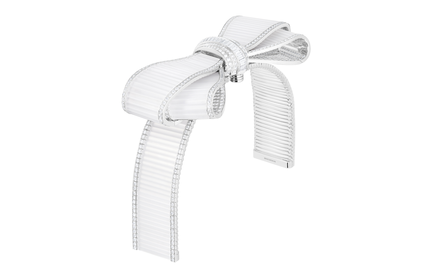  Boucheron Noeud shoulder brooch (transformed from the necklace) set with a 4.05-carat pear-cut diamond and rock crystal, paved with diamonds in 18k white gold, from the Histoire de Style The Power of Couture High Jewellery Collection