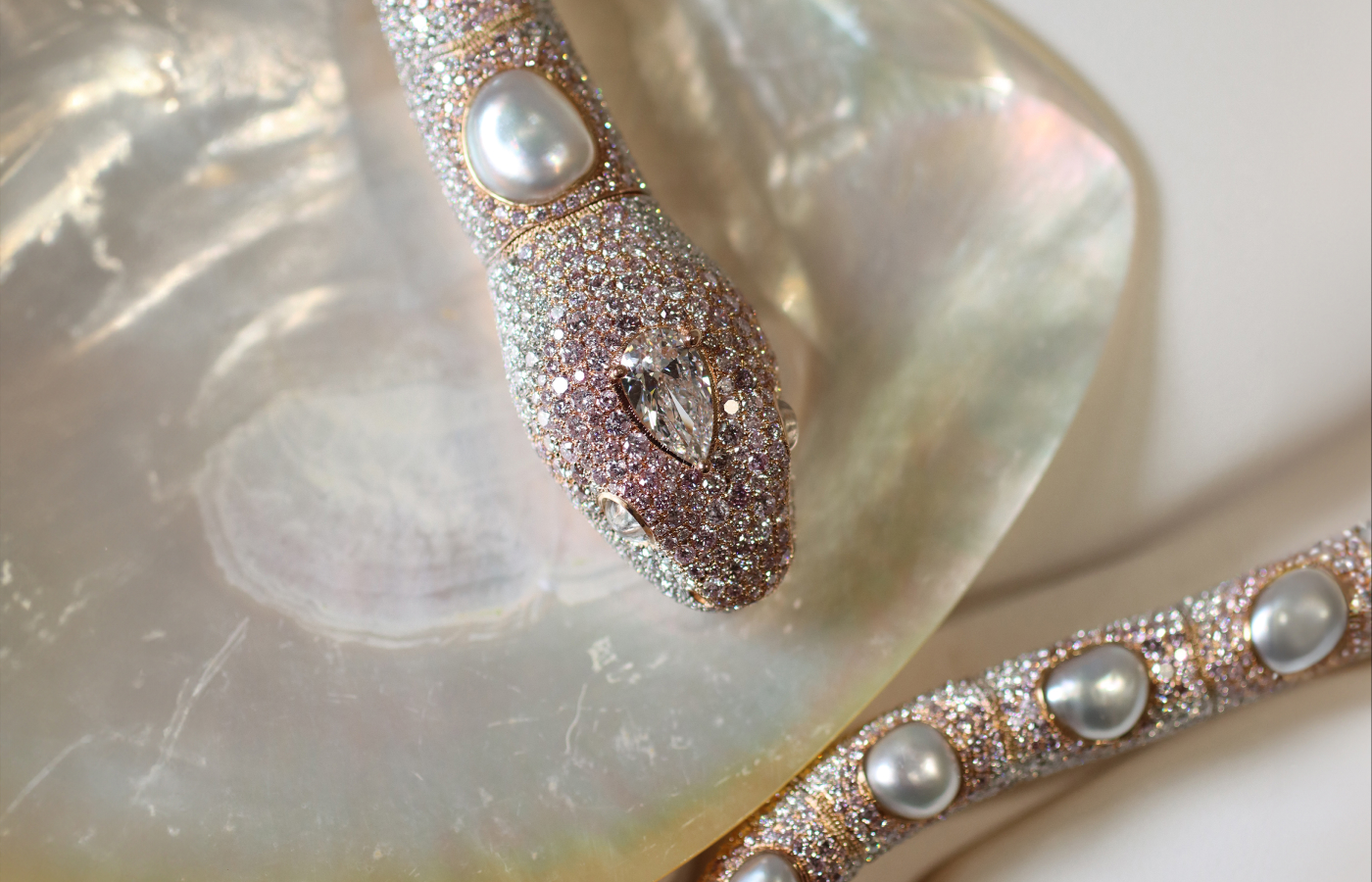  The Autore Enchantress necklace features a 2-carat pear-shaped E colour, VVS clarity white diamond that sits like a crown on the head of the snake 