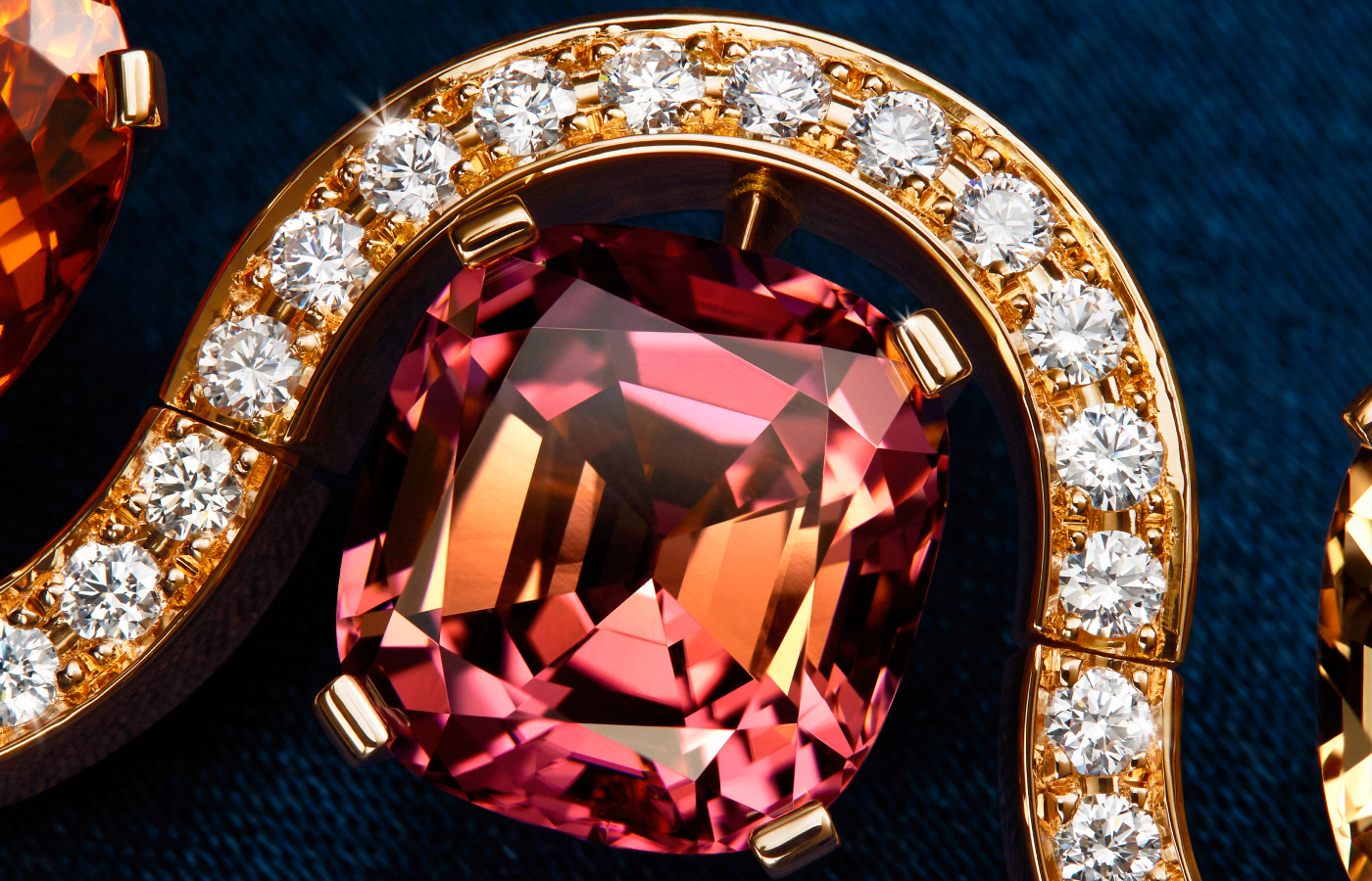  A closer look at the vibrant orangey-pink shades of tourmaline used in the Bucherer Fine Jewellery Manhattan High Jewellery collection 