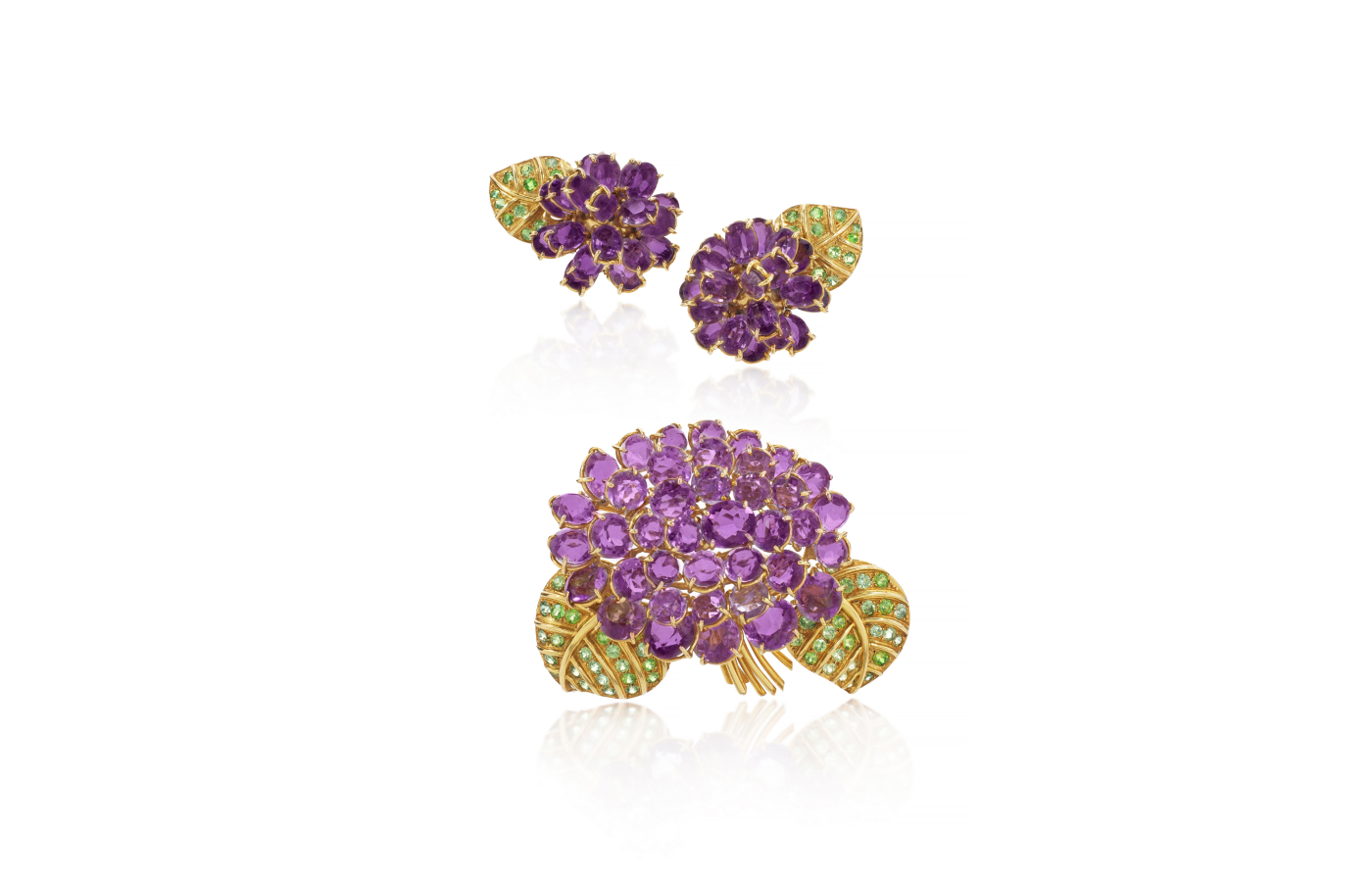 René Boivin 'Bouquets de Violettes' amethyst and peridot demi-parure, circa 1960 (estimate CHF 25,000-45,000), part of the Sotheby’s ‘Iconic Jewels: Her Sense of Style’ auction in May 2024