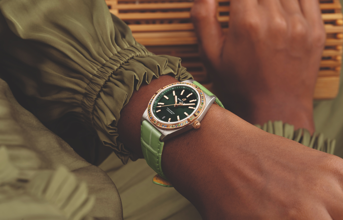  Model wearing Breitling Chronomat Automatic 36 South Sea in stainless steel, red gold and multicoloured gemstones