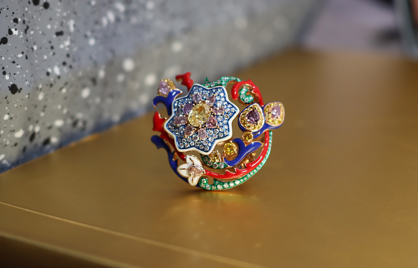 Austy Lee ‘The Datura of Eden’ ring from The Gnostic Vines collection in 18k rose gold with fancy purplish pink, pink and vivid yellow diamonds, red, blue and white enamel and white diamonds