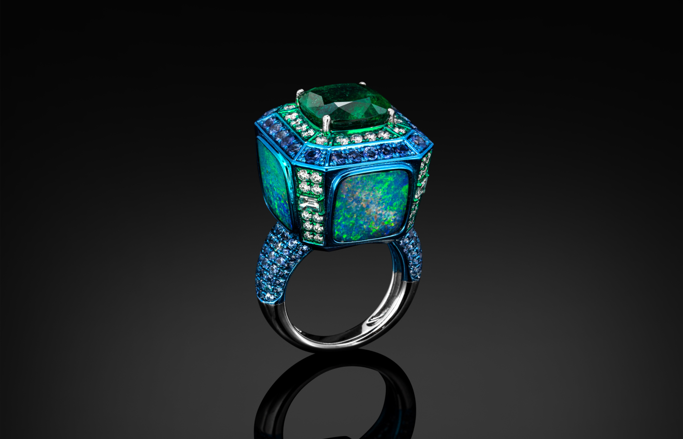 Austy Lee ‘The Dice of Emerald World’ ring from The Poetry of Art collection in 18k white gold with Zambian emerald, Australian opals, tsavorites, blue sapphires and white diamonds 