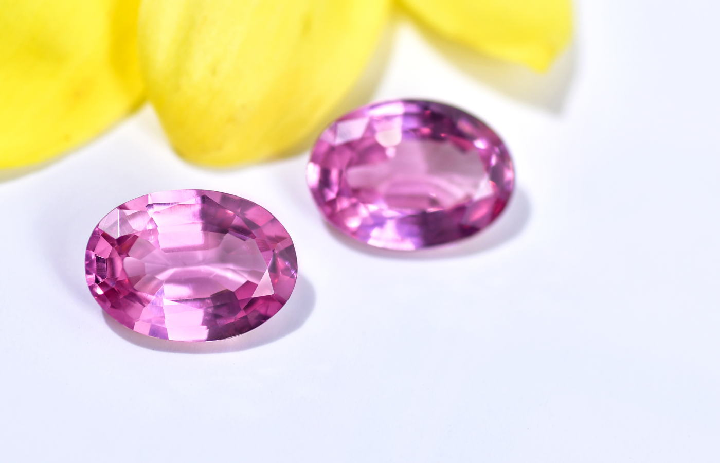 A pair of oval-shaped pink spinels from Tajikistan, totalling more than 7 carats, crafted by Minehaus