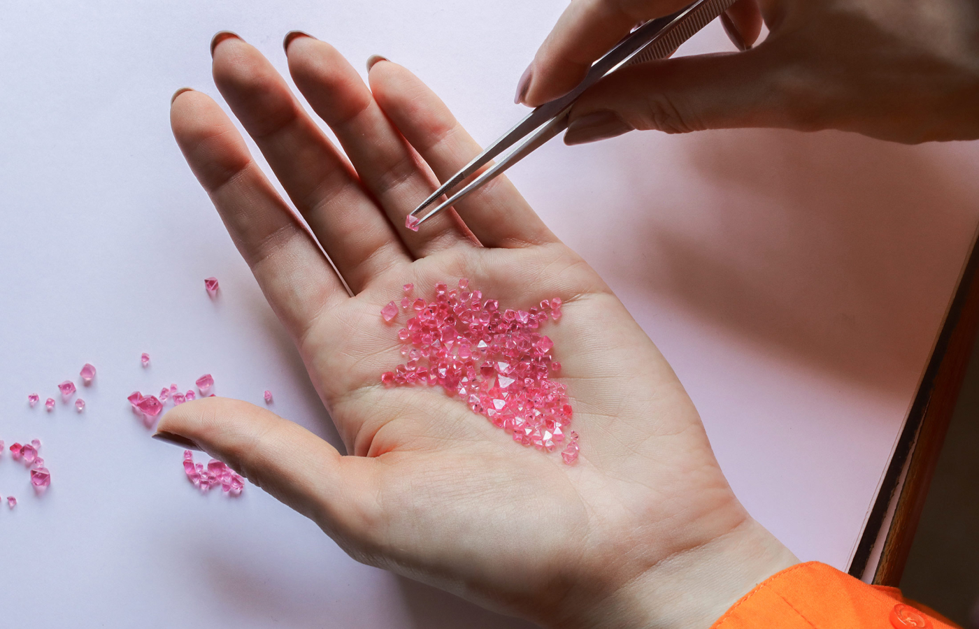 Katerina Perez takes a closer look at natural octahedral pink spinel crystals at Minehaus' facilities in Jaipur, India