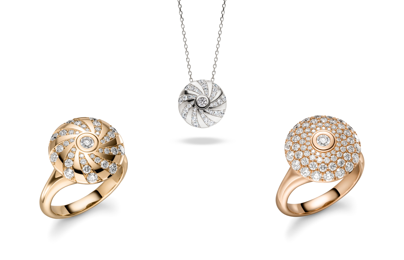 From left to right: Schaffrath Collection 360° ring with diamonds in yellow gold, the Collection 360° necklace with 1.50 carats of diamonds in white gold, and the Collection 360° ring with diamonds in rose gold 