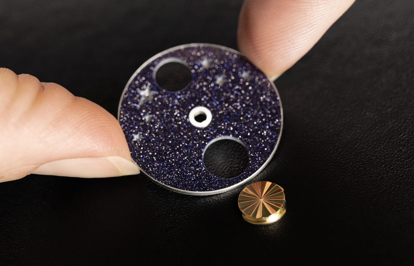  The golden sun element in the Van Cleef & Arpels Lady Jour Nuit watch with a 33mm case in white gold, to be showcased at the Poetry of Time exhibition in London