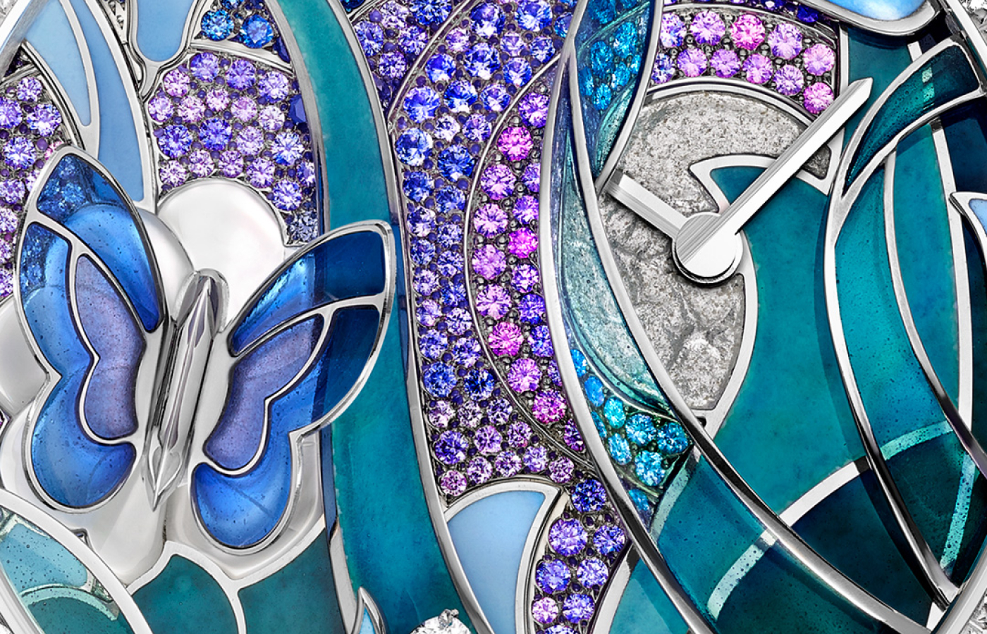  A closer look at the purple-hued sapphires set into the Van Cleef & Arpels Lady Arpels Papillon Automate watch, alongside mother of pearl, champlevé, paillonné and plique-à-jour enamel