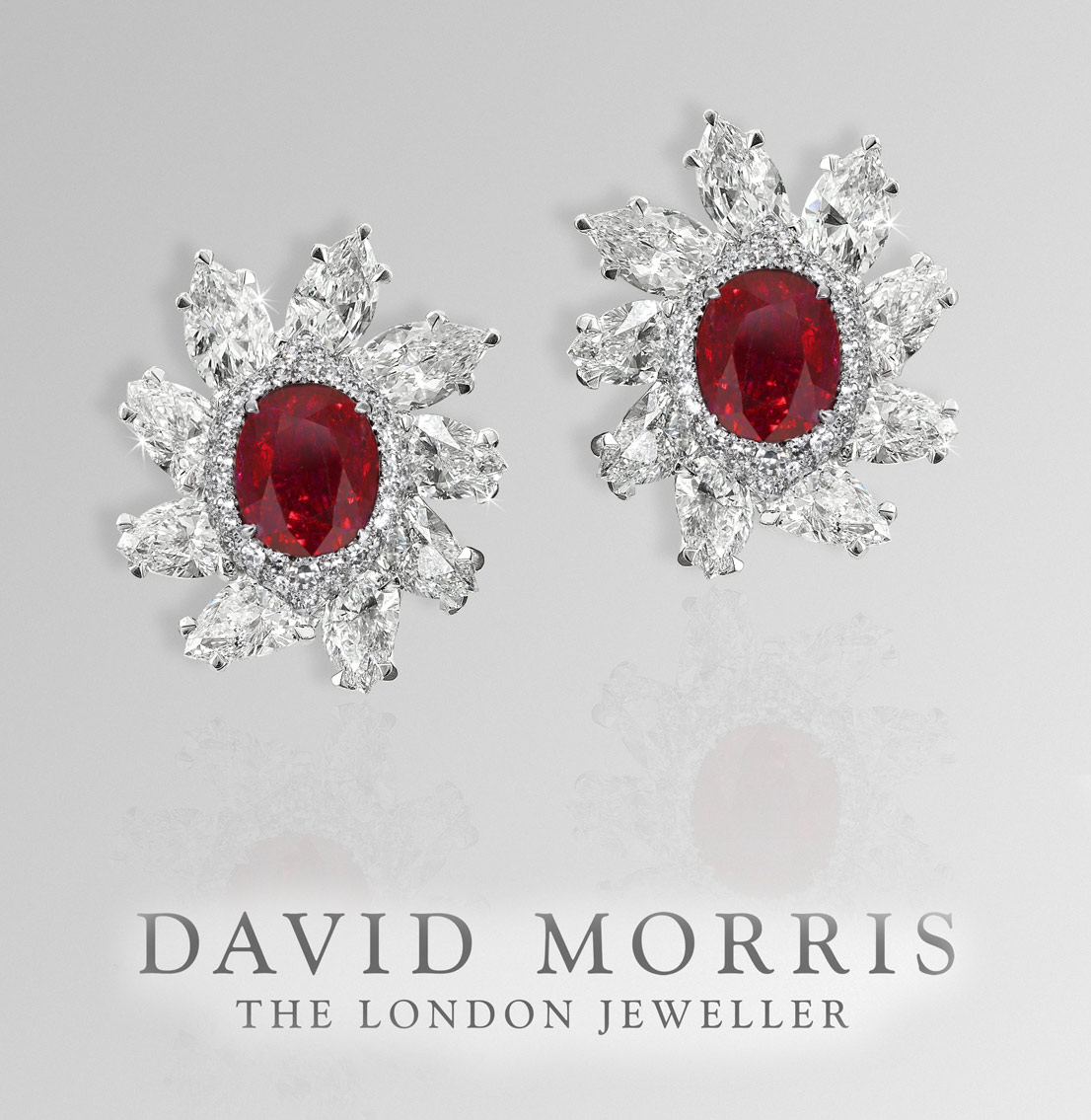 David Morris Pigeon blood Ruby earrings, 5.09ct and 5.02cts each with no heat treatment. Rubies are surrounded by pear-shaped diamonds and set in 18ct white gold