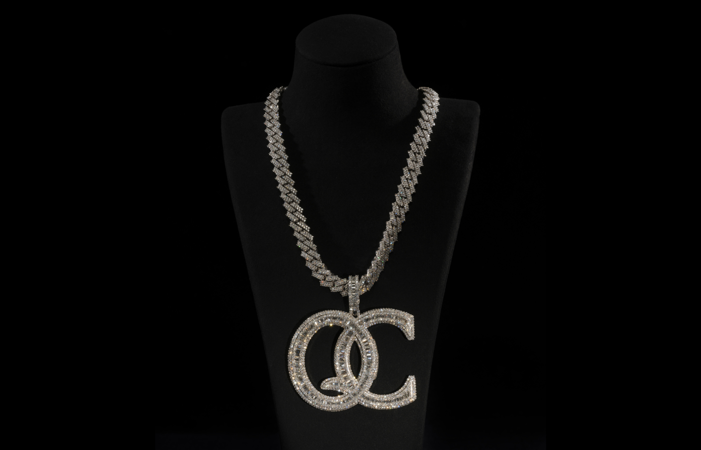  A symbol of the Atlanta-based powerhouse Quality Control Music, Coach K’s QC necklace is set with diamonds in 14K white gold and was designed by Wafi of Jewelry Unlimited in 2021. Alvaro Keding/© AMNH