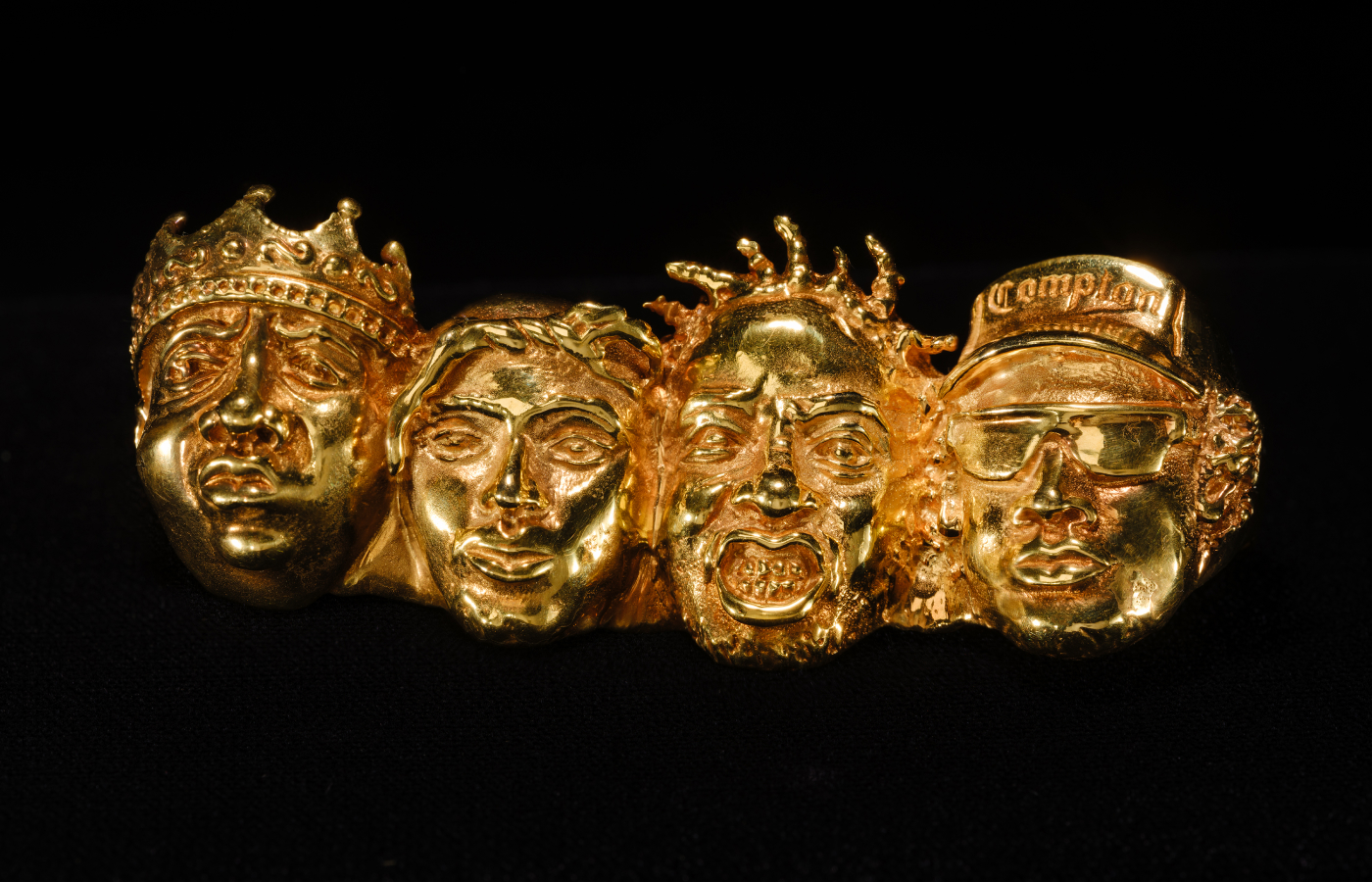  Designed by Johnny Nelson, the 14K Fingers of Def four-finger ring is from his Mount Rushmore series and honors four trailblazing male hip-hop artists: Biggie, Tupac, Ol’ Dirty Bastard, and Easy-E. Alvaro Keding/© AMNH