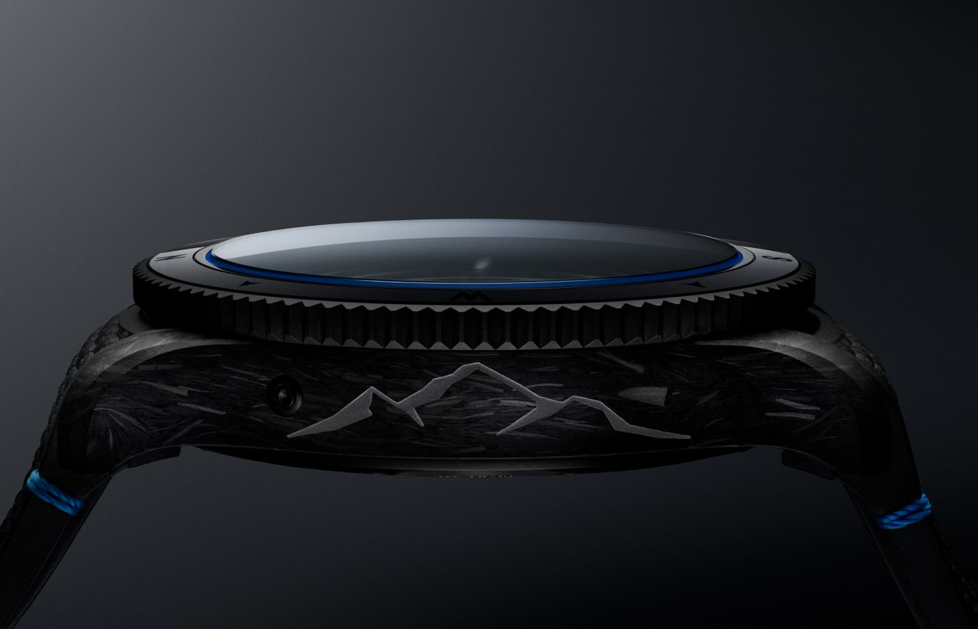  Case side of the Montblanc 1858 Geosphere 0 Oxygen CARBO2 watch engraved luminous blue outline of the Mont Blanc Mountain on the side that only the timepiece’s wearer can see