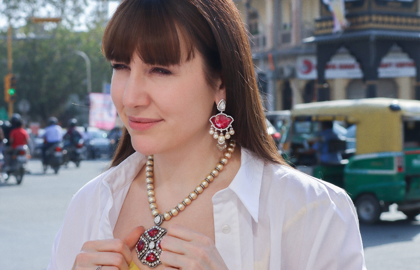 Katerina Perez wearing Amrapali earrings and necklace in gold set with rubies, pearls, spinels and diamonds 