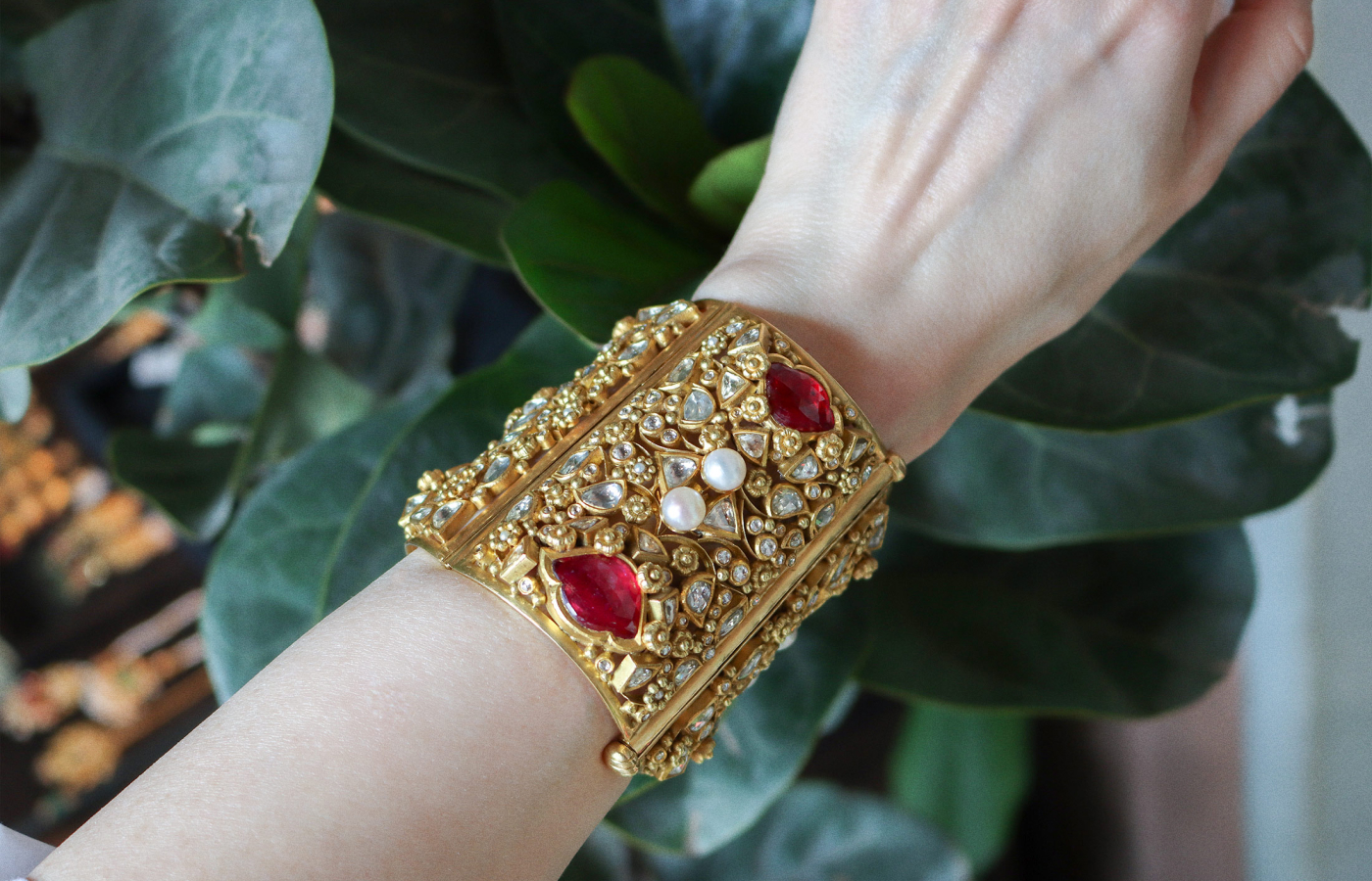  Katerina Perez wearing an Amrapali bangle in gold set with pearls, rubies and polki diamonds