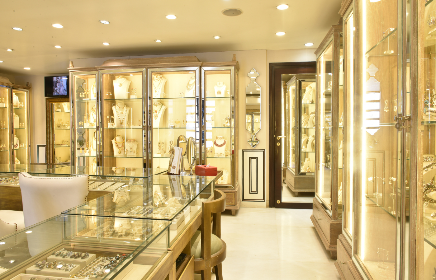  Window cases displaying the beautiful one of a kind creations inside the Amrapali boutique in Jaipur