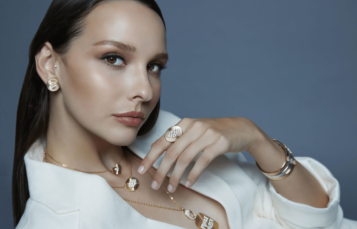  Model wearing Marceline Paris pieces from the Seven Sisters collection and Wisdom Graffiti collection in gold, white gold, rose gold and diamond