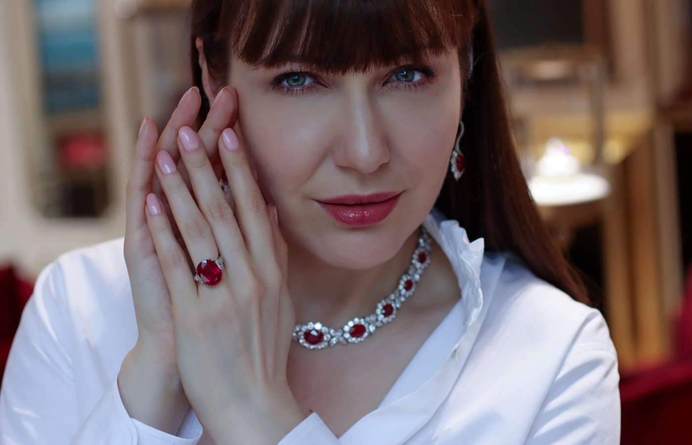 Katerina Perez wearing a ruby and diamond high jewellery suite  by Bayco