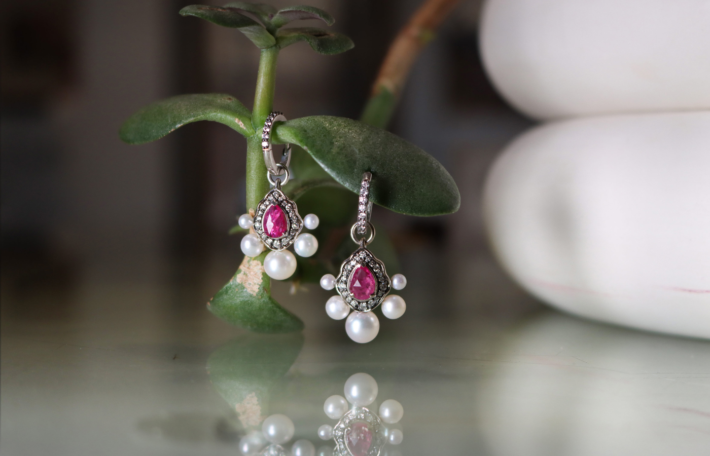  Anna Sheffield Camellia Petal earrings in white gold and black rhodium set with Gemfield rubies,  Akoya pearl and reclaimed white diamond
