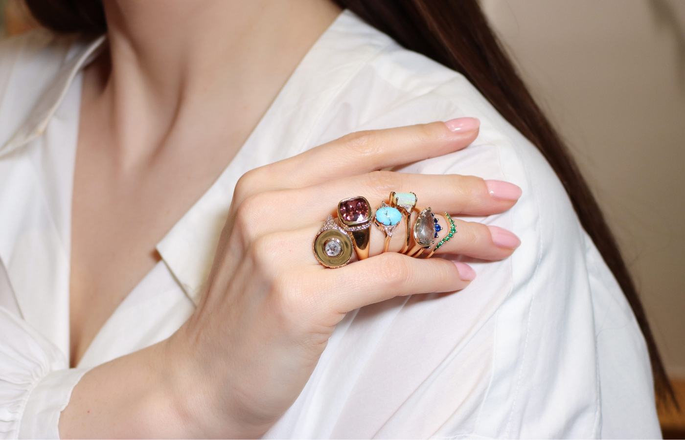  Katerina Perez wearing a mix of gemstone and diamond rings by Anna Sheffield