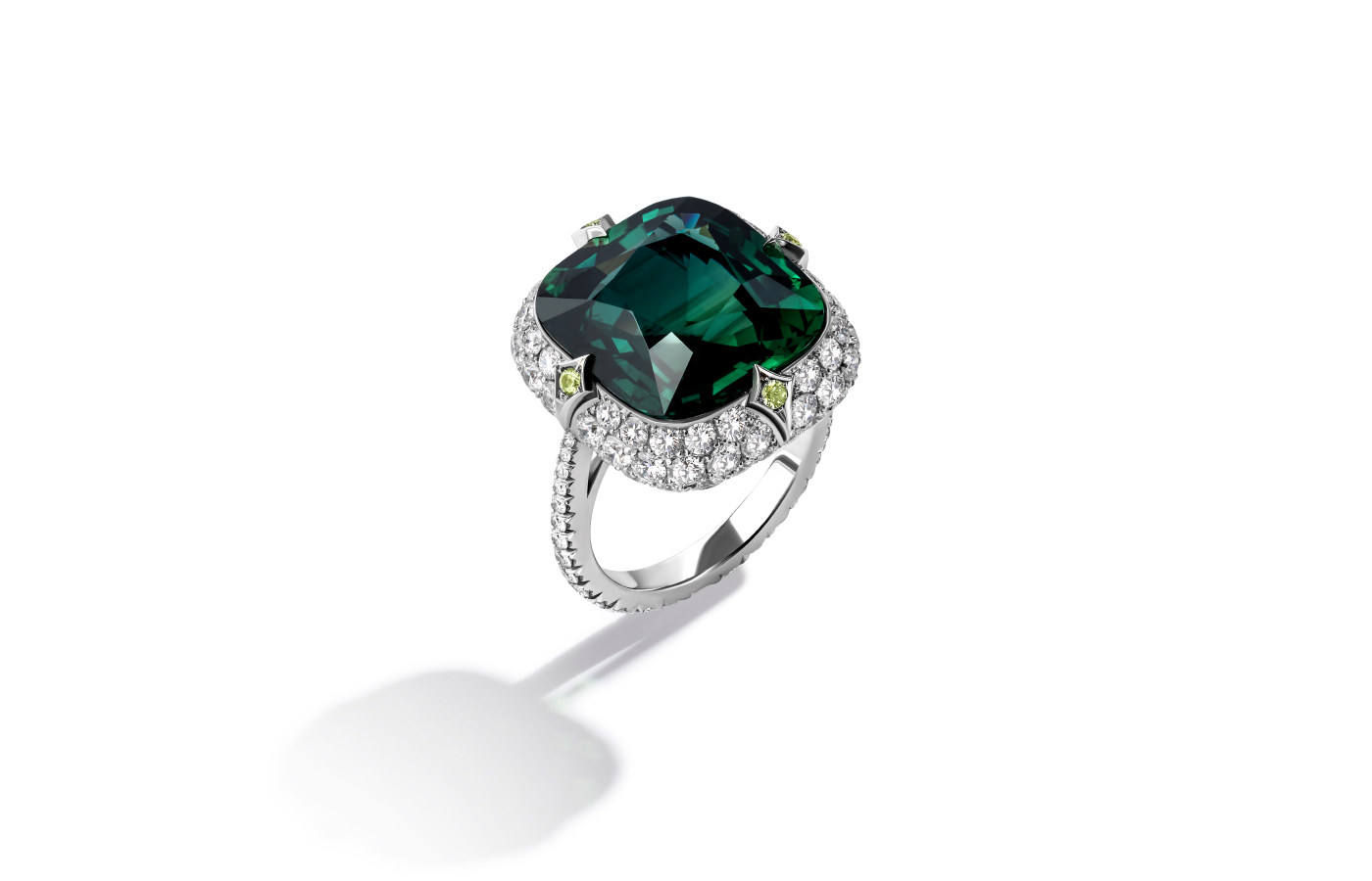  Bayco ring in platinum set with a 13-ct green sapphire, green sapphires and diamonds