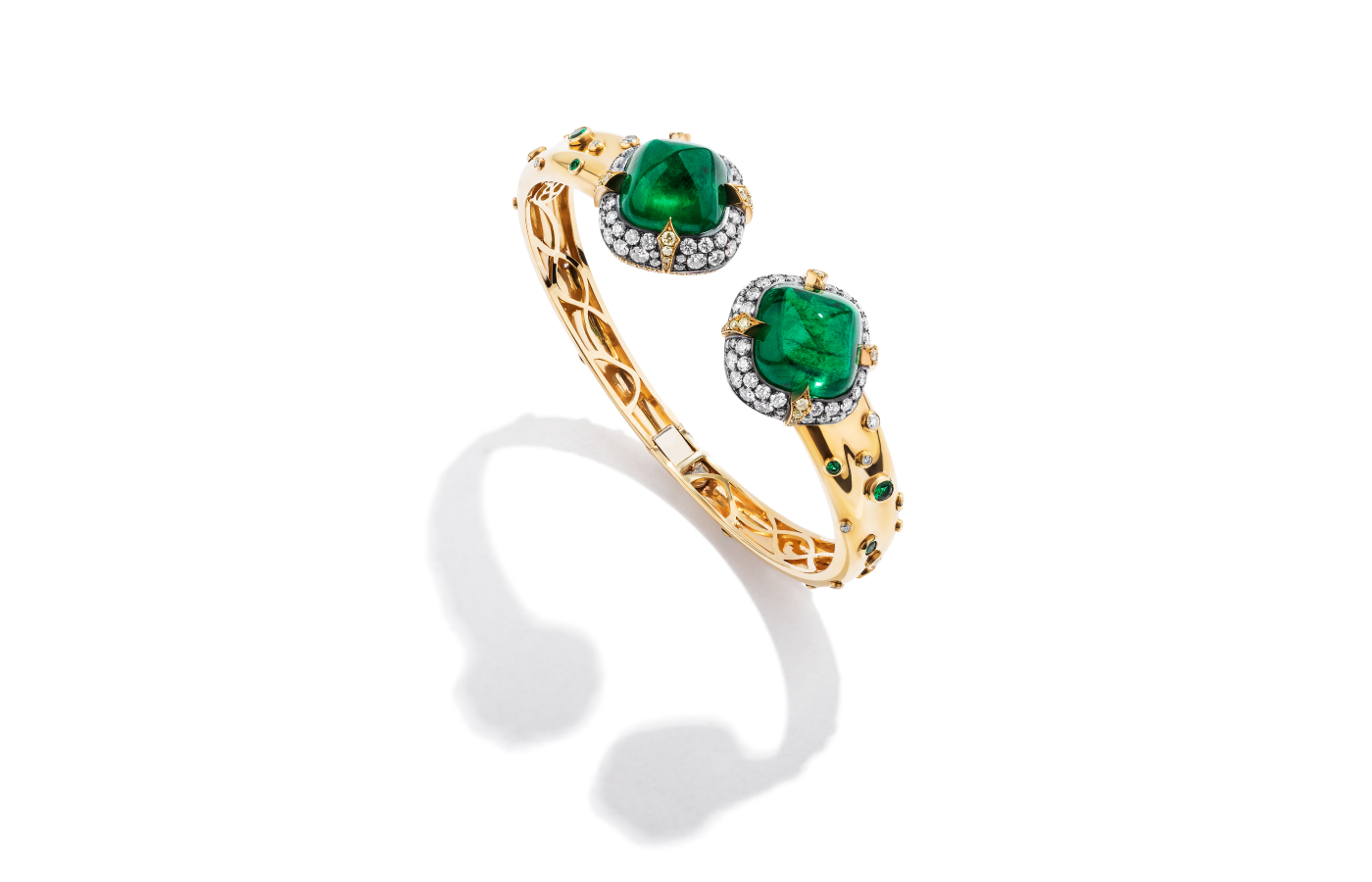  Bayco bangle in gold and oxidised silver set with a pair of 20-ct sugarloaf cabochon Colombian emeralds, round-cut emeralds, round-cut fancy yellow diamonds and diamonds